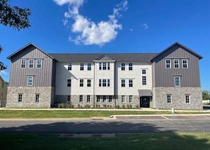 Apartment Building Exterior at Pure Lowell, Arkansas