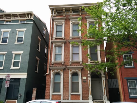 a red brick building on a city street