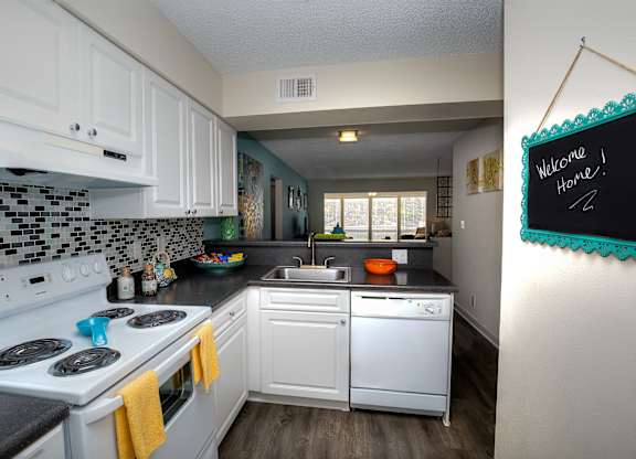 Spacious kitchens include plenty of above and below cabinet storage and meal prep space.