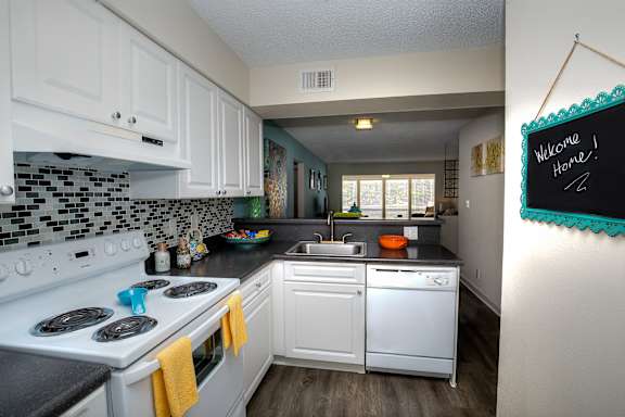 Spacious kitchens include plenty of above and below cabinet storage and meal prep space.
