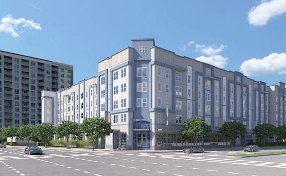 A large, modern building with a blue and white facade.