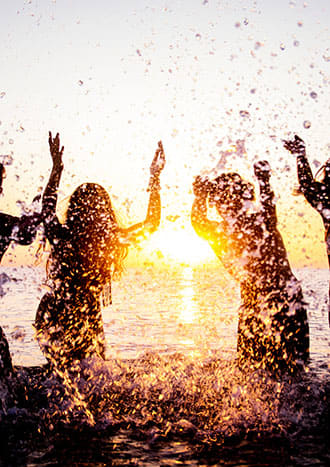Group of people splashing in the ocean Captiva Club Miami Florida Apartments at Captiva Club, Miami, 33157
