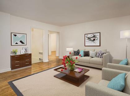a living room with couches and a coffee table