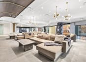 Thumbnail 22 of 41 - a lobby of a building with couches and tables at Up House, Farmington, 06032
