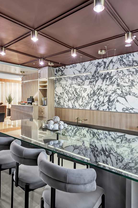 a rendering of a lobby with a large couch and chairs at The Meriden, Meriden, 06450
