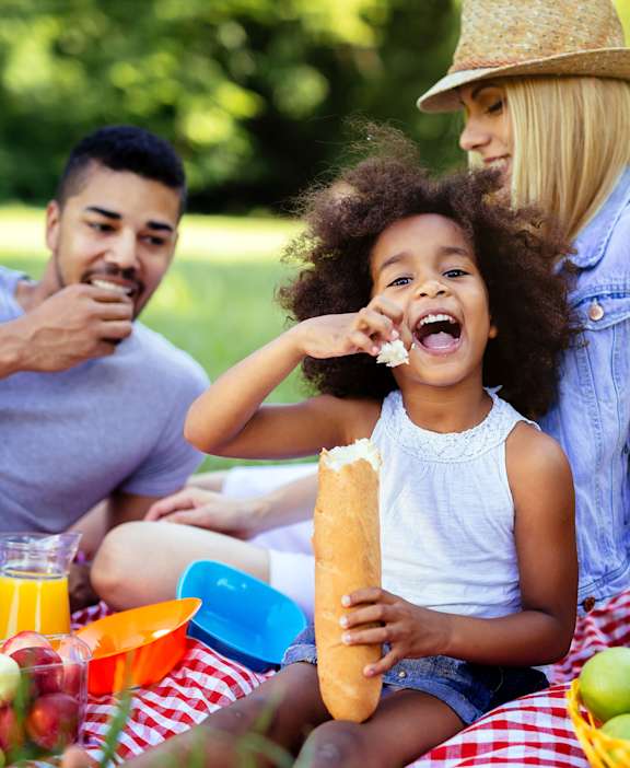 A family having a picnic in a park.