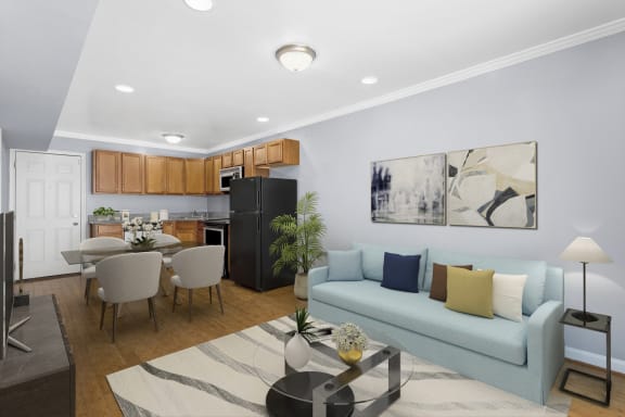 a living room and kitchen in a 555 waverly unit