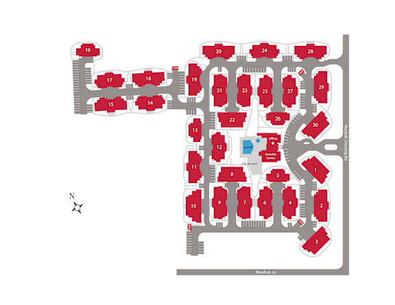 A map of a residential area with numbered houses and a compass rose indicating north.