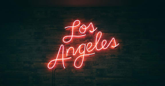 a neon sign that reads los angeles