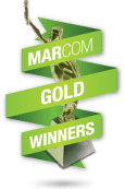a logo with the words maroon gold winners