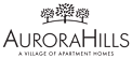 The image is a logo for a company named Aurora Hills, which is a village of apartment homes.