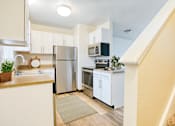 Thumbnail 1 of 21 - Entryway Kitchen