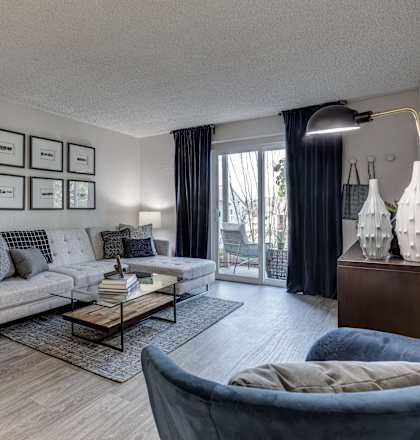 a living room with two couches and a coffee table