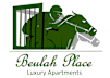 a logo of a person sitting on a horse