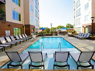 Refreshing Pool With Large Sundeck And Wi-Fi at Link Apartments® West End, Greenville, SC