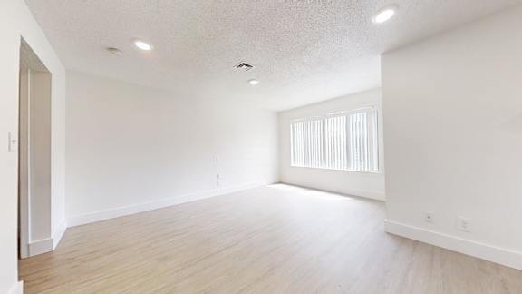 Spacious Living Room With Plank Flooring at Avia Lofts at Maple Road, Amherst, NY, New York, 14221