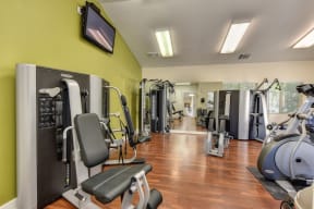 Fitness Center with Ellipticals, Weight Machines and Hardwood Inspired Floors