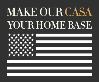 A poster with the American flag and the text "Make our casa your home base".