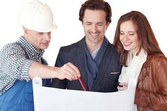 a group of people looking at a piece of paper