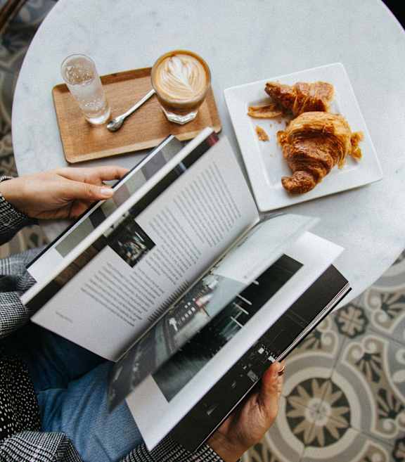 Table with coffee and croissant at Wilmington Flats Apartments, Salt Lake City, UT, 84106