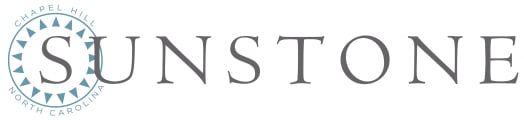 the logo or sign for the guest house