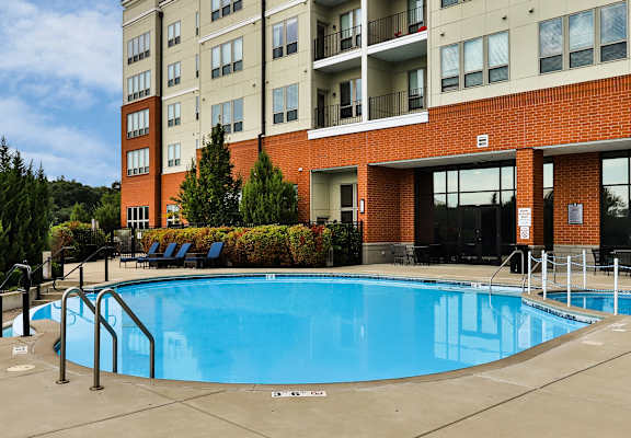 Sparkling swimming pool at The Streets of St. Charles Apartments in Missouri, 63303
