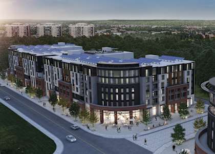 an aerial view of a building with a city in the background at The Woods, Kanata, Ottawa, Ontario