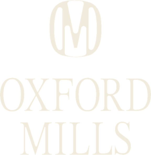 A black and white image of an oval label reading Oxford Mills at 100 W. Oxford St, Philadelphia P.A. 19122 South - Kensington.