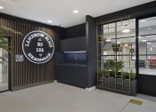 Thumbnail 1 of 19 - the lobby of a restaurant with a large clock on the wall