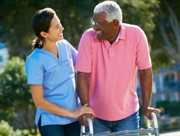 A service coordinator helping a disabled senior