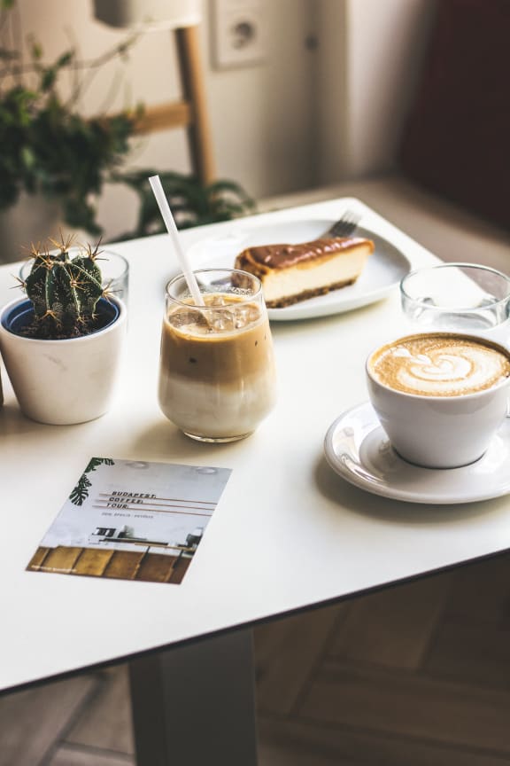 a table with coffee and cake on it