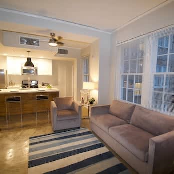 TJ Tower model apartment living room at dusk