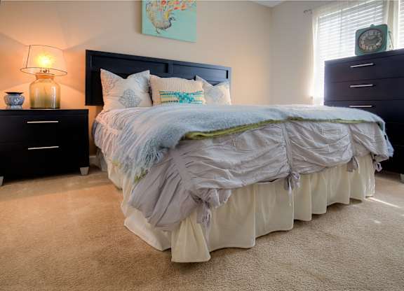 Spacious bedrooms feature wall-to-wall carpet.