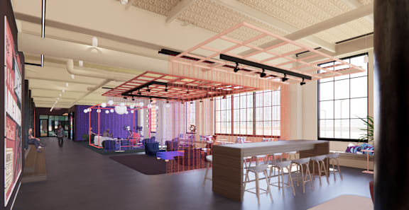 A modern office space with a long table and chairs. at University Commons in Pittsburgh, PA