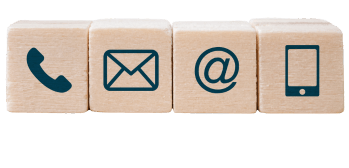 three cardboard boxes with different symbols on top of each other