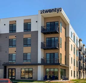 a building with a sign on the top of it