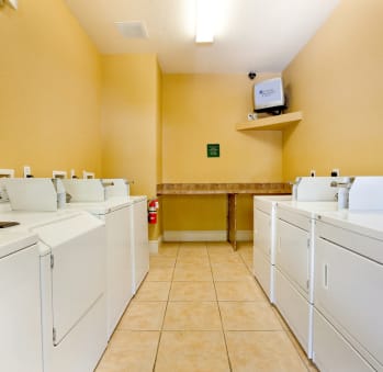 a washer and dryer room at the village at indian point resort and conference center