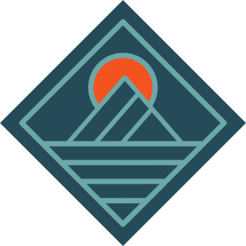 A graphic of a mountain with a sunrise or sunset at its peak.
