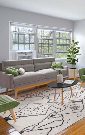 a living room and dining room with hardwood floors
