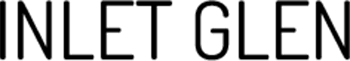 a man sitting on top of a couch next to a window