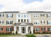 Thumbnail 2 of 23 - exterior of VistaView apartments entrance in Frederick, MD