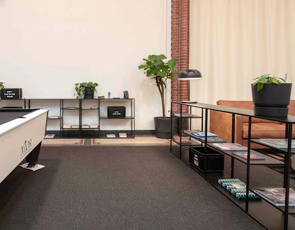 a game room with a pool table