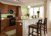 Thumbnail 9 of 23 - view of kitchen from living room at VistaView apartments in Frederick, MD