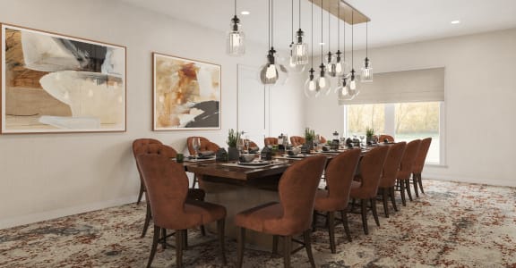 a dining room with a long table and chairs