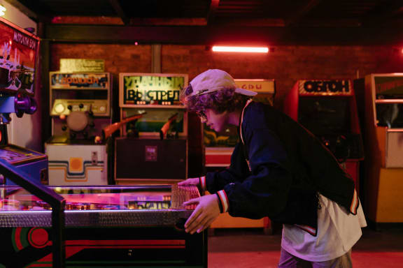 a man playing a game on a table