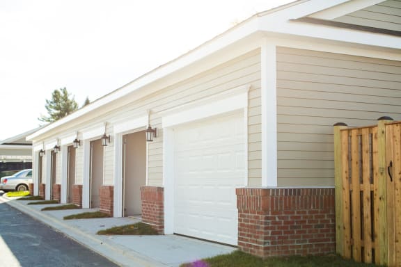 individual garages at VistaView apartments in Frederick, MD  with white doors at VistaView, Frederick, MD