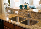 Thumbnail 8 of 23 - kitchen countertop at VistaView apartments in Frederick, MD  with stainless steel double sink at VistaView, Frederick