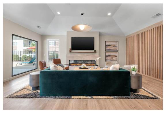a living room with a couch and a tv