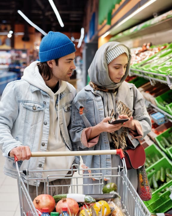 Couple grocery shopping