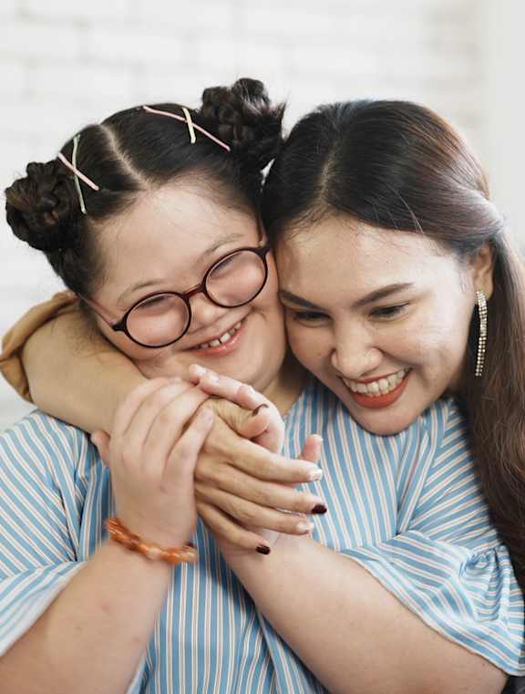 Two women hugging each other at Union at Tower District, Topeka, KS